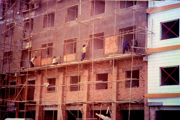Plastering Brick Building