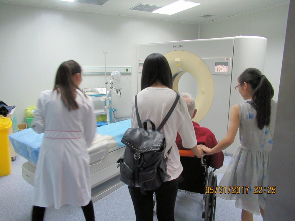 Wheeled into CT Scanner  