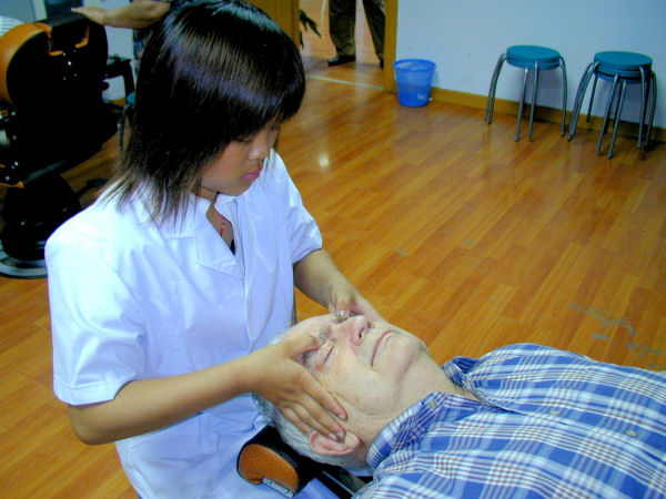 Staff Massages Paul's Eyes