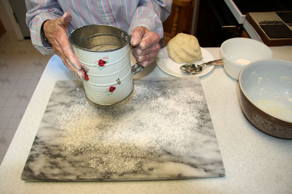 Step 13 - Dust Table with Flour