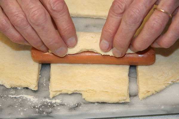 Step 17 - Roll Dough on Hot Dog