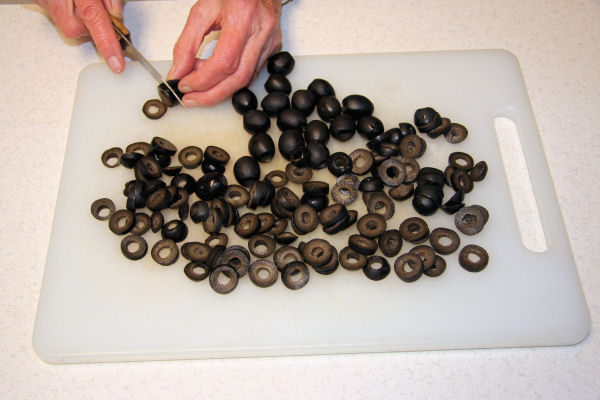Step 1- Slice Pitted Black Olives 
