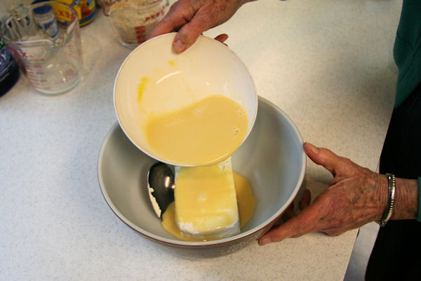 Step 16 - Pour Egg Mixture on Cream Cheese 