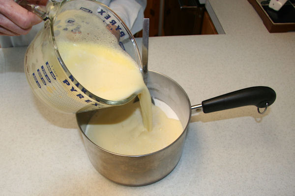 Step 13 - Pour Milk and Eggs