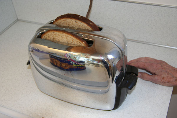 Step 18 - Bread Into Toaster