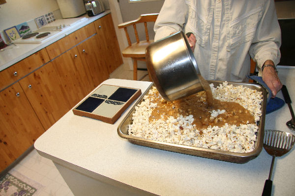 Step 14 -  Pour Syrup onto the Popcorn