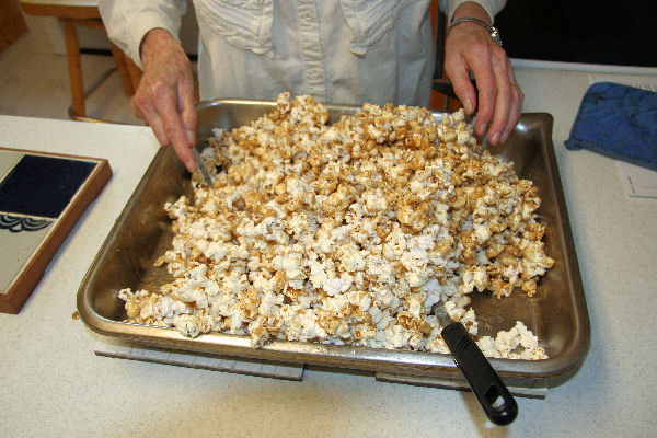 Step 15 -  Stir the Popcorn and Syrup