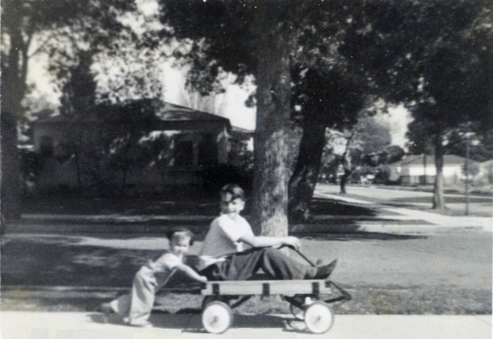 Loren Pushes Paul in the Wagon