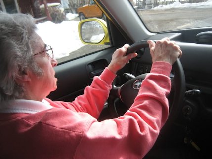 Elderly Lady Driving a Car  