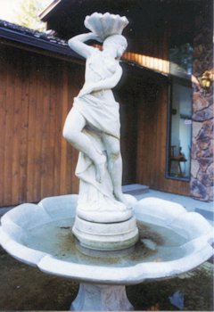 The Old Statue in the Pond